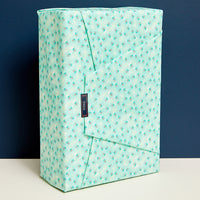 Pliage enveloppe de la feuille cadeau L Vert Vincennes – On s’emballe à la française